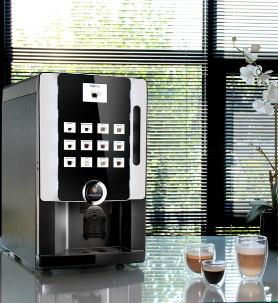 A professional "Business Line" espresso machine with a large touch-screen menu, pictured on a glass table next to three double-walled glass coffee drinks and a white orchid.