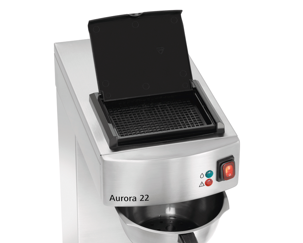 An overhead angle of the Aurora 22 thermal brewer with the top filter lid open, revealing the internal basket area and the stainless steel brew head.
