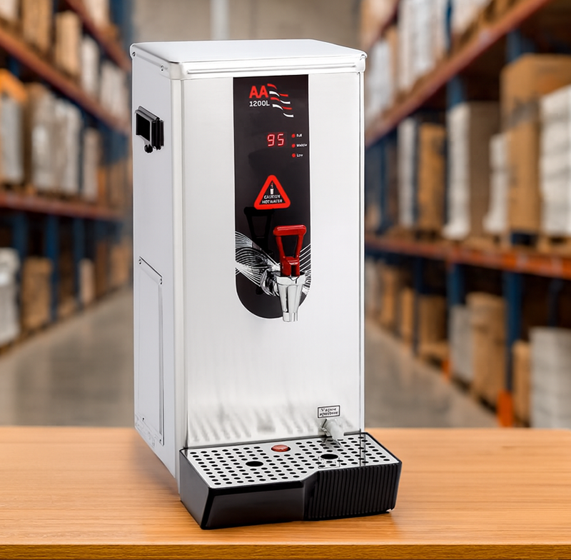 An AA 1200L stainless steel water boiler with a digital temperature display showing 95 degrees, situated on a wooden table with a blurred warehouse background filled with stocked pallet racking.
